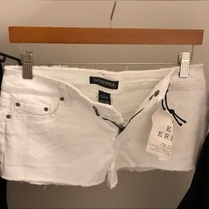 White denim raw hem shorts.